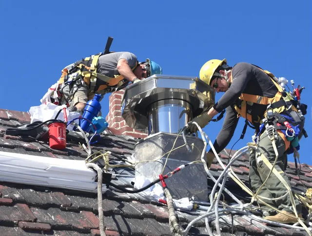 Protective chimney cap installed by Daytona Beach Chimney Sweep in Daytona Beach, FL