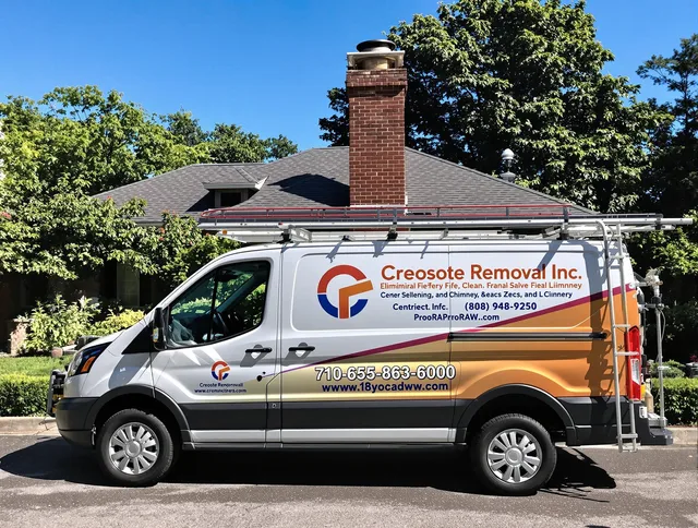 Daytona Beach Chimney Sweep technician removing creosote safely in Daytona Beach, FL
