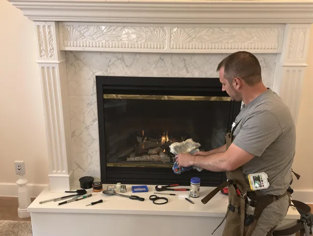 Daytona Beach Chimney Sweep performing fireplace maintenance in Daytona Beach, FL